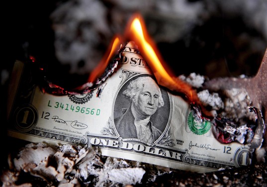 ap_economy_crisis_money_burning_Press_Association_via_AP_Images