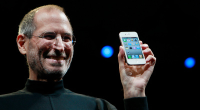 Steve Jobs holds iPhone