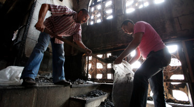 images archives stories Reuters Pictures Reuters Egypt Christians clean church attacked Cairo photog Mohamed Abd El Ghany