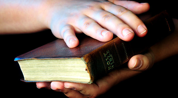 holding Bible