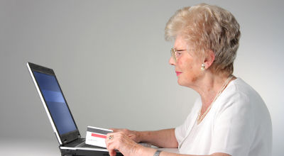 old woman using computer