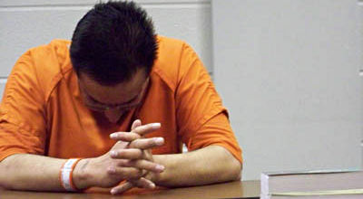 prisoner praying