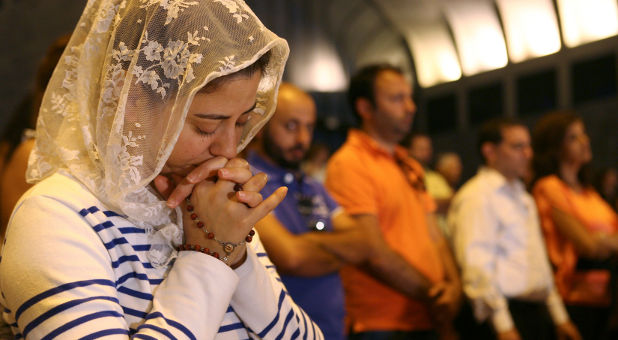 Syrian Christians pray