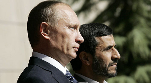 Russian President Vladimir Putin (left) and former Iranian President Mahmoud Ahmadinejad.