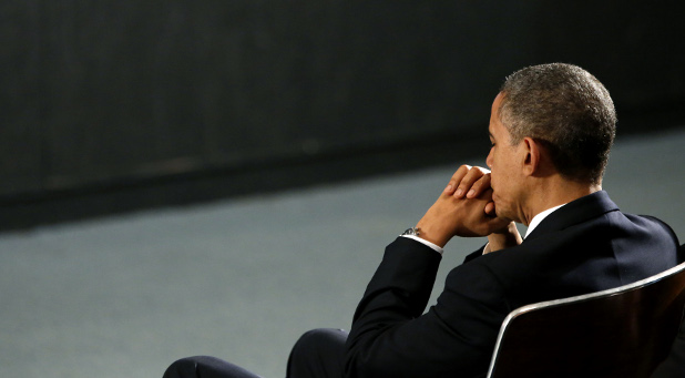 President Obama in prayer