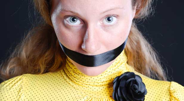 woman taped mouth