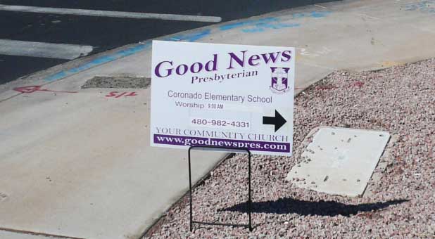One of the contested Good News Community Church street signs