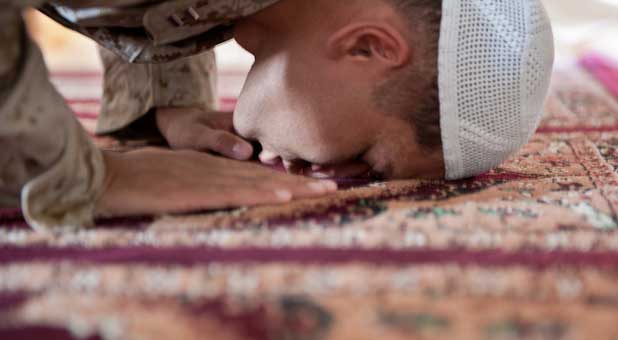 Muslim man praying during Ramadan