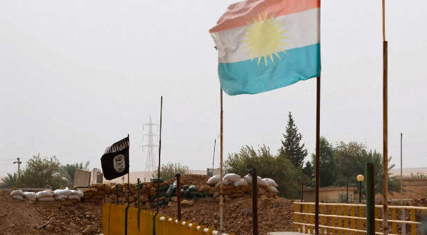 Islamic State and Kurdish flags