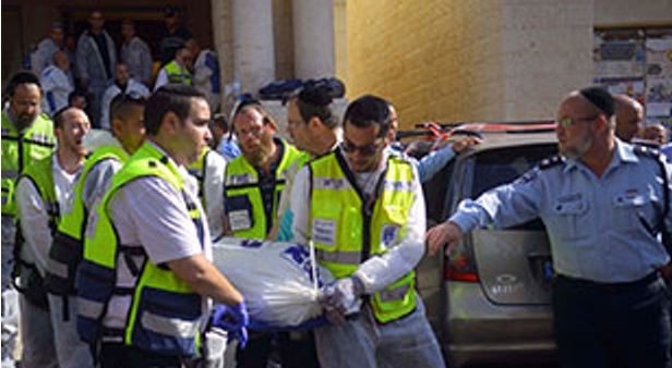 Ambulance picks up victims of synagogue shooting.