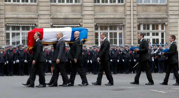 A funeral for one of the victims in the French terrorist attacks.