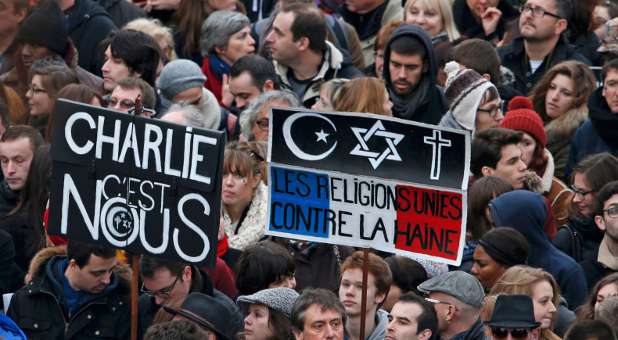 French citizens stand in solidarity with Charlie Hebdo.
