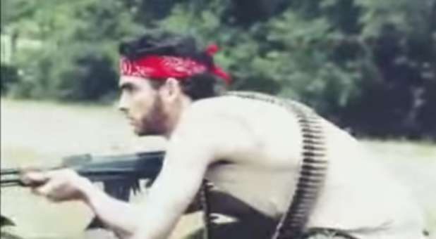 Man with assault rifle in jihad war