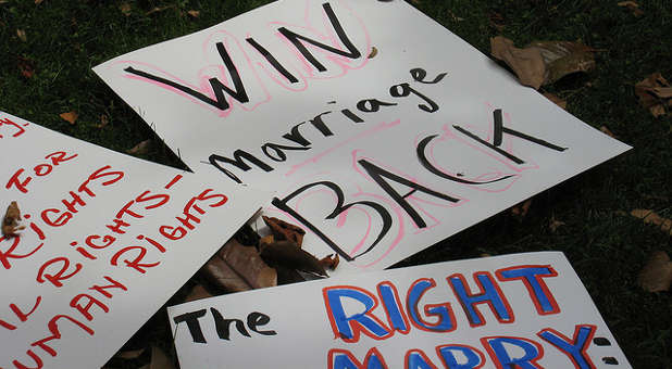Protest signs from a marriage rally