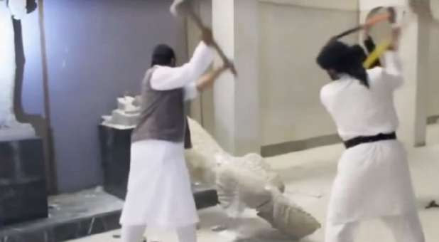 A new video shows Islamic State fighters breaking historic artifacts.