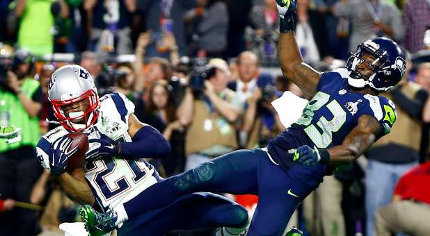 The New England Patriots' Malcolm Butler intercepts a pass meant for Seattle Seahawks' Ricardo Lockette