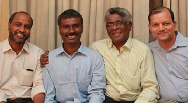 Rev. Alexis Prem Kumar, second from the left, is surrounded by friends soon after his release. To the far left is Rev. T.R. John and third from the left is Rev. Leonardo Fernando and Rev. Denzil Fernandes on the far right.