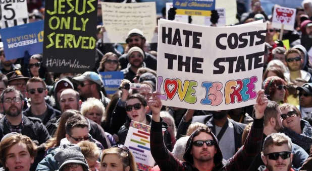 LGBT supporters gather in Indiana to protest the Religious Freedom Bill.