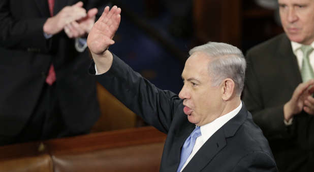 Israeli Prime Minister Benjamin Netanyahu waves prior to his address to a joint meeting of Congress in the House Chamber on Capitol Hill in Washington, March 3, 2015.