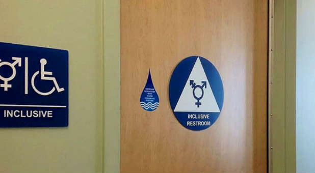 A gender-neutral restroom sign. The White House has opened it's first gender-neutral restroom.