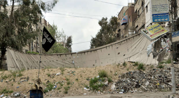 An Islamic State flag in Syria. Judicial Watch reports the terrorist organization has landed in Mexico.
