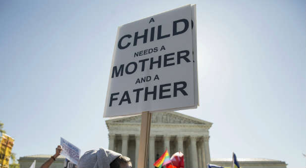 Supporters of traditional marriage protest gay marriage outside the Supreme Court.