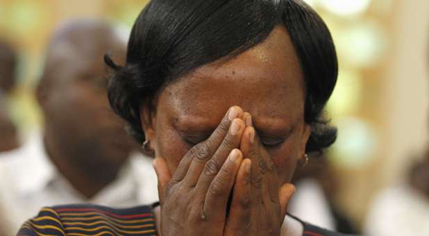 A Kenyan woman mourns the terrorist attack on the university.