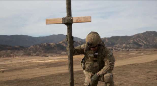 soldier with cross
