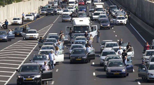 Jews everywhere in Israel stopped on the highway and got outside of their cars to remember those survivors and those lost in the Holocaust during World War II.