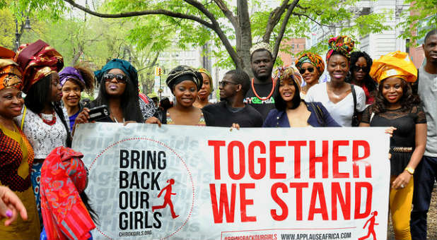 People protest terrorist organization Boko Haram and the kidnapping of hundreds of girls.