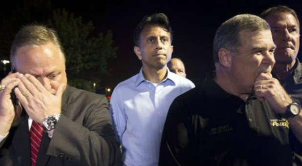 Louisiana Gov. Bobby Jindal prepares for a press conference after a theater shooting in Lafayette.