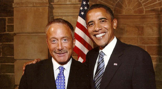 Terry Bean (L) poses with President Barack Obama before Bean's arrest