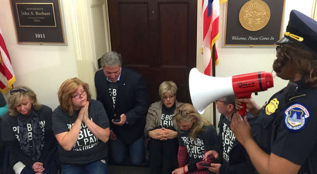 Pro-lifers protest abortion at the office of House Speaker John Boehner.