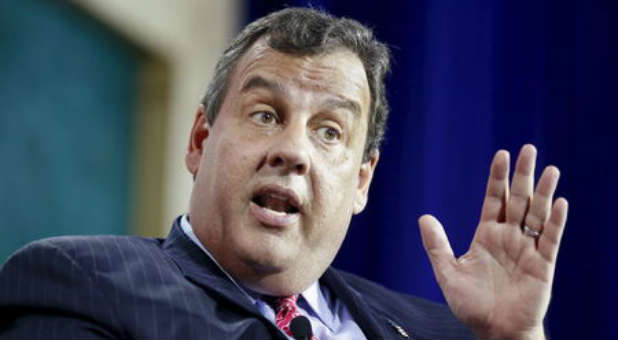 Chris Christie defended his immigration plan, which involves tracking people like FedEx packages.