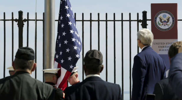 Secretary of State John Kerry presides over the raising of the American flag in Cuba.