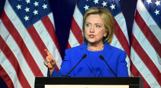 Democratic presidential hopeful Hillary Clinton is going on the attack, comparing Republican presidential candidates to terrorists because of some of their pro-life views.