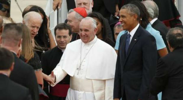 U.S. President Barack Obama, right, stands with Pope Francis on the pope's U.S. tour.