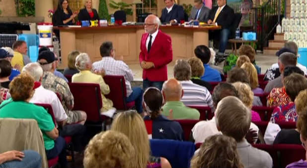 Jim Bakker speaks a powerful message to the crowd.