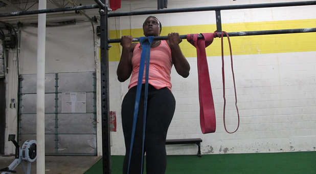 Woman doing pullup