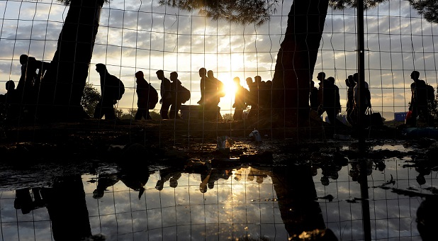 2015 politics syrianrefugees shadowedfiguresmarching macedonianborderwithgreeceseptember2015 reuters