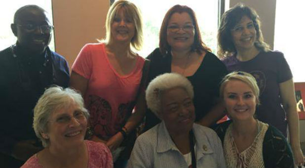 Alveda King (back row, second from right) with her mother, Naomi (bottom center).