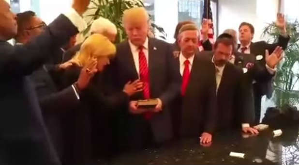 Paula White prays over Donald Trump.