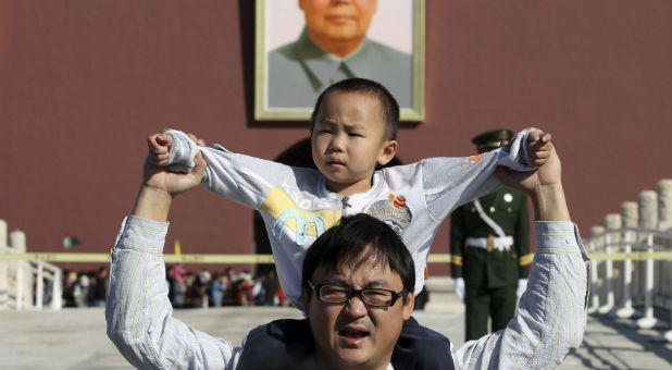 A father and son in China. China recently put a stop to their controversial one-child policy.