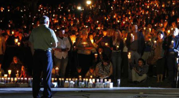 Hundreds gather to honor those killed in a shooting rampage in Oregon.