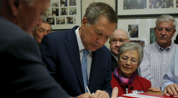 Republican presidential candidate John Kasich says he would set up a government agency to promote Judeo-Christian values overseas to counter propaganda from Islamists.