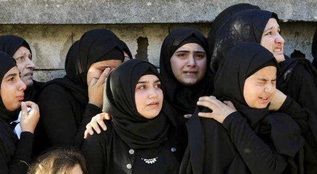 Muslim women mourn for people killed in recent terror attacks. Author and humanitarian aid worker Ray says the church has a chance to step up and relieve their suffering.