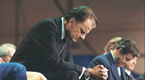 Billy Graham tops list of world's most admired men a record 59 times.