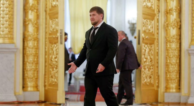 Chechen President Ramzan Kadyrov walks before a meeting of the state council at the Kremlin in Moscow.