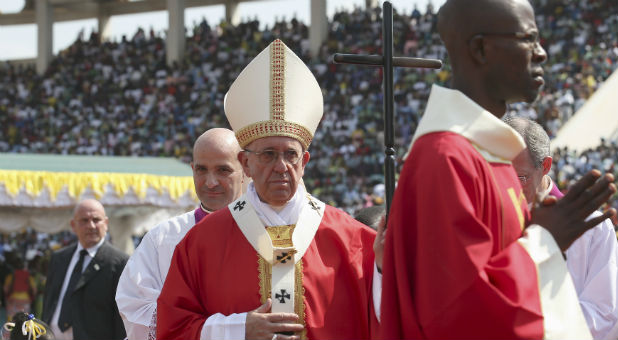 Pope Francis prepares to celebrate mass in Africa.