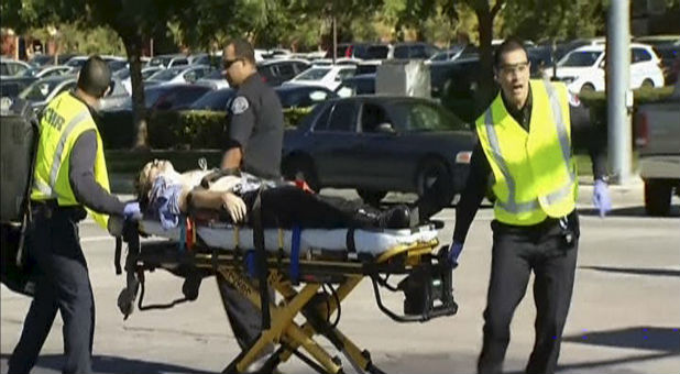 Medics assist a victim of the San Bernardino shooting.